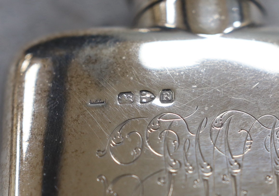 A late Victorian silver hip flask, engraved with later date and initials, William Neale & Sons, Chester, 1900, 12.1cm, gross 5.4oz.